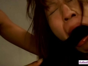 Asian Prisoner To Lick Pussy Getting Both Holes Fucked With Sticks By 3 G